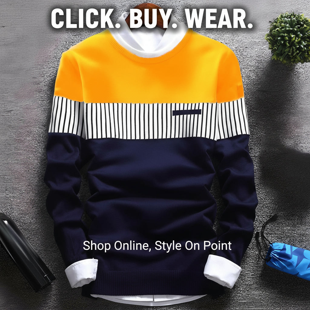 Color-blocked sweater with yellow, navy, and white design on a gray surface.