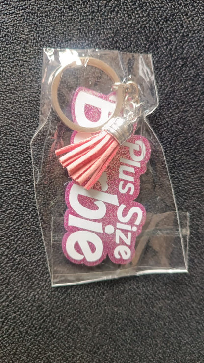 Text Keychain With Glitter Finish And Tassel Charm (1 Pc)